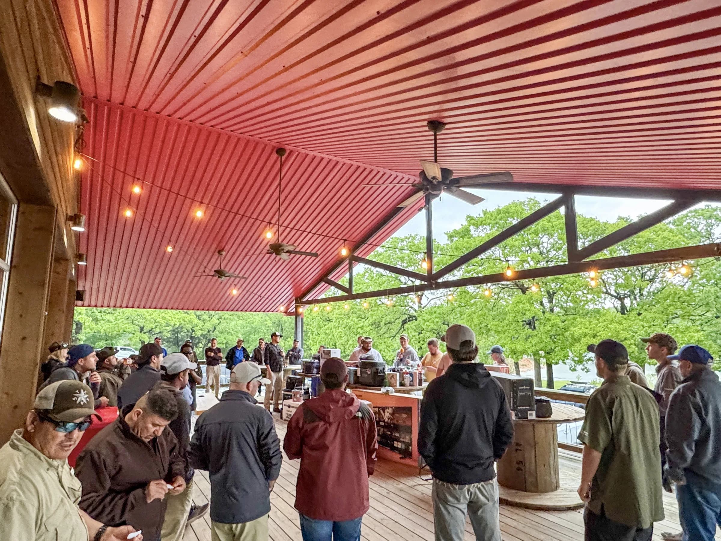 Guests enjoying a company gathering on the Lodge deck