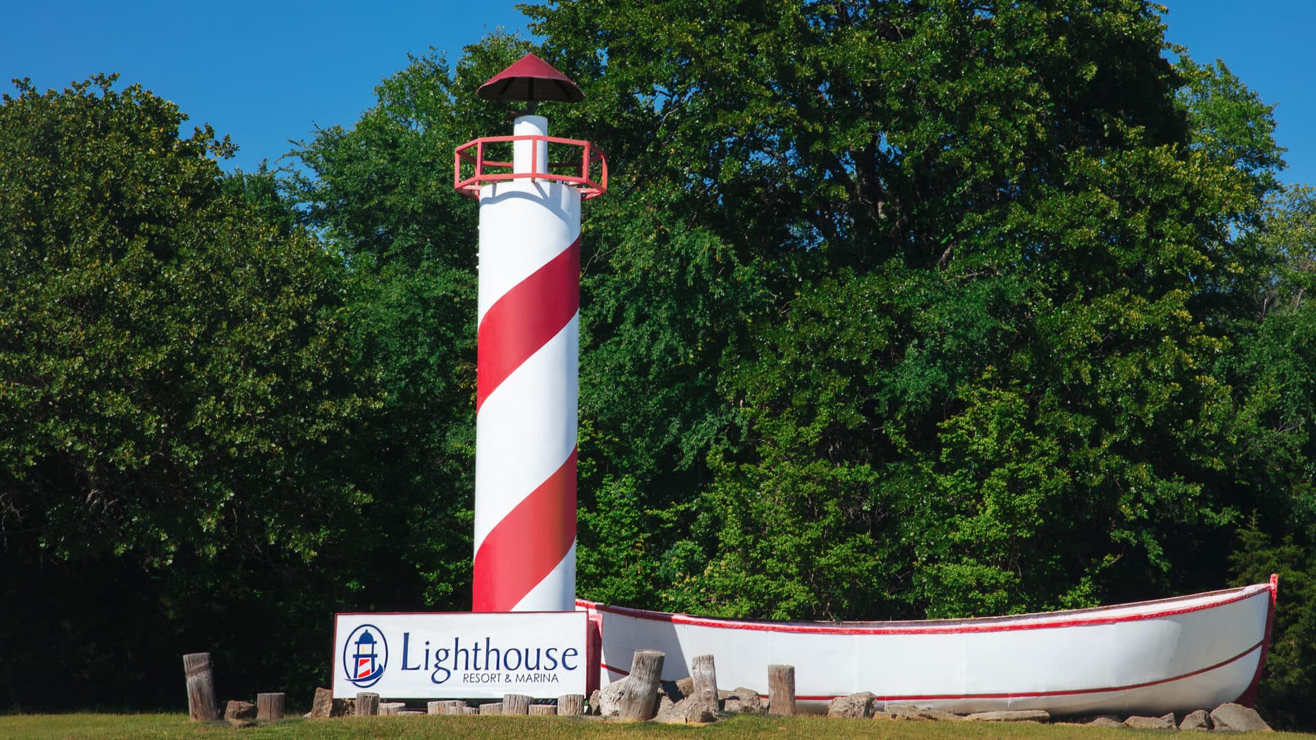 The red-and-white lighthouse welcoming guests to the resort