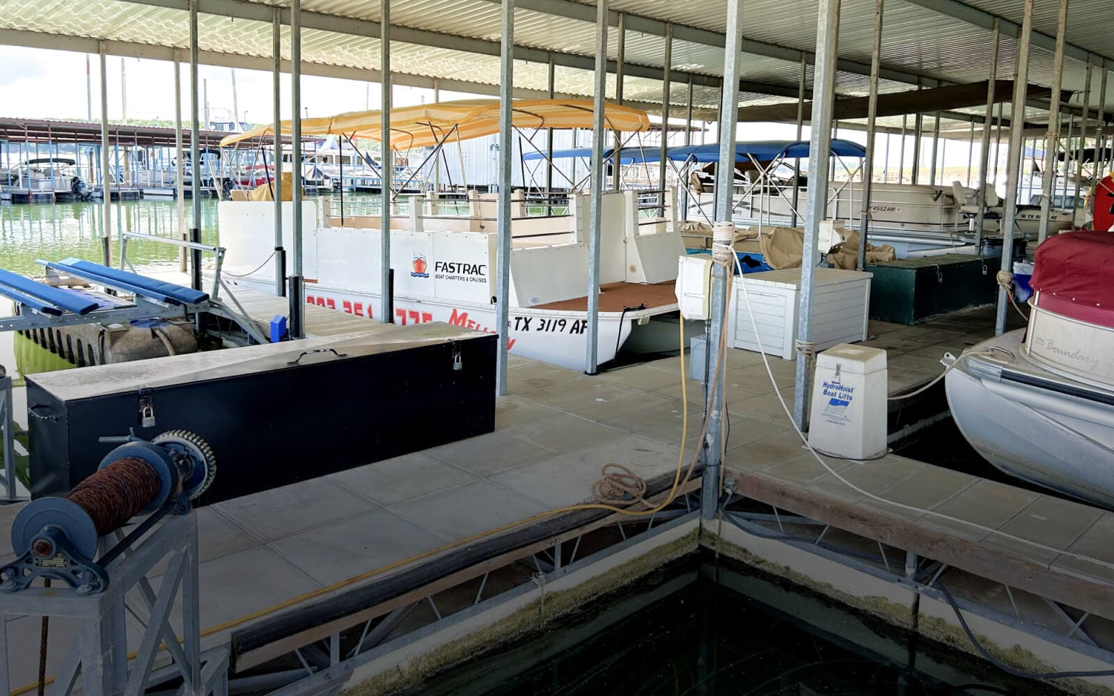 The covered slips and docks at Lighthouse Marina